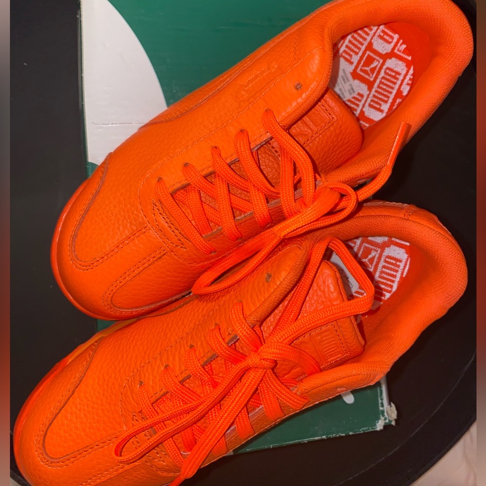 Never worn pumas size 3 orange red